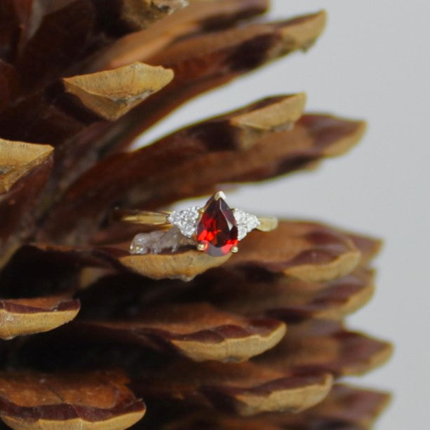 9ct Yellow Gold Pear Garnet Tri Shoulder Ring